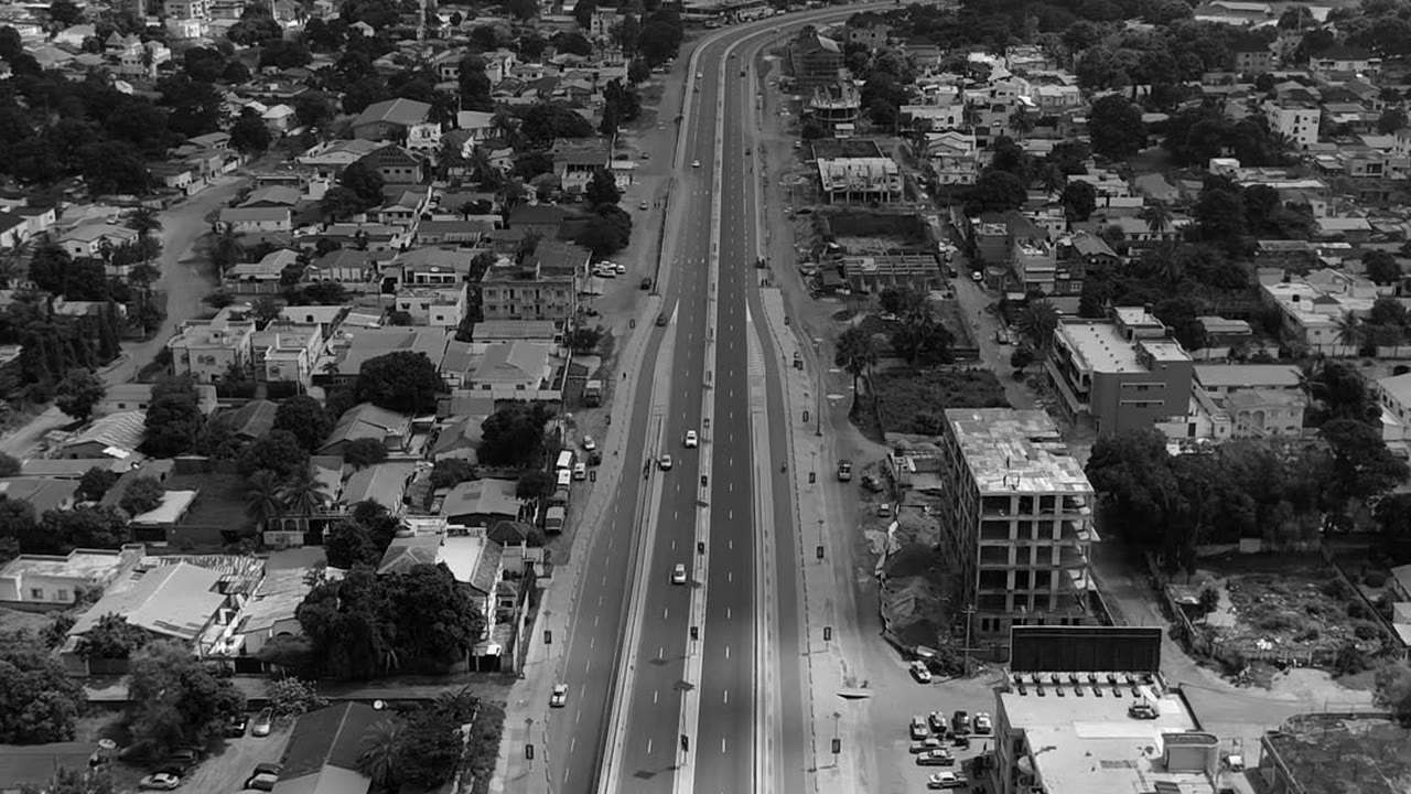 Drone photograph of a road through Greater Banjul, 13 October 2026