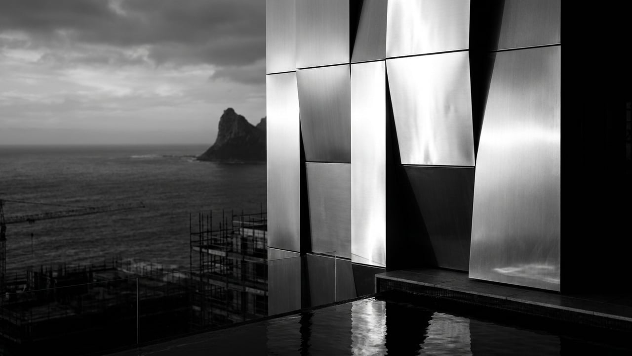 Facade detail in silver light over the ocean