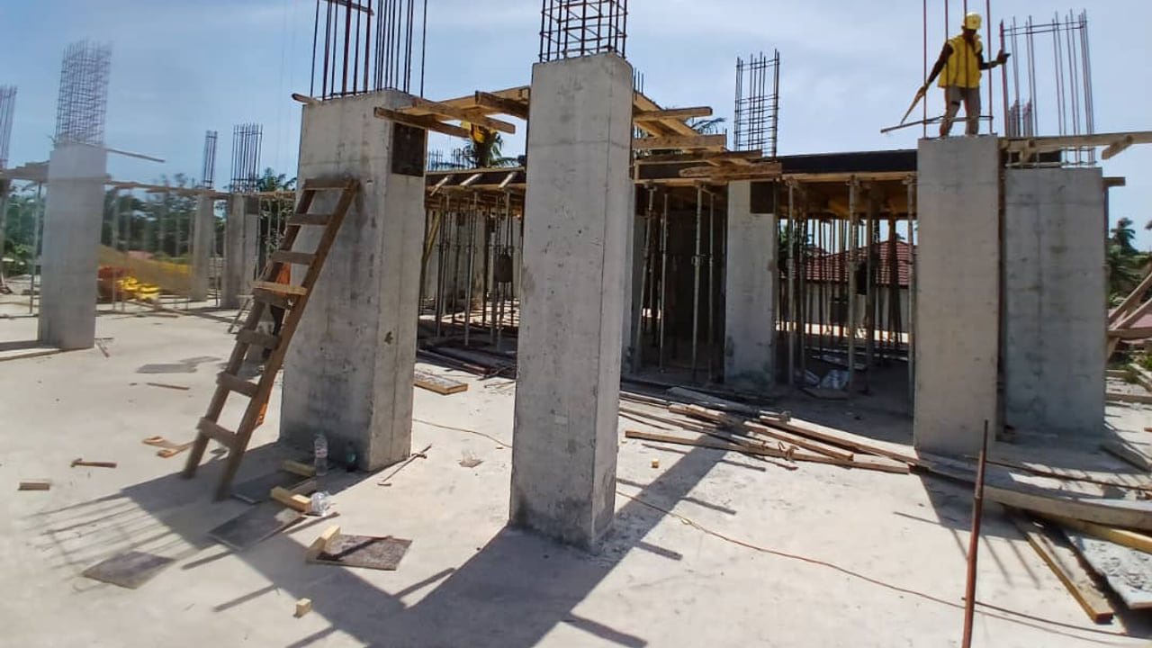 Real construction photo of concrete columns and structural frame at Platinum Tower