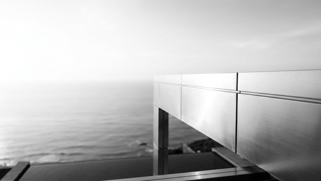Facade detail in silver light over the ocean