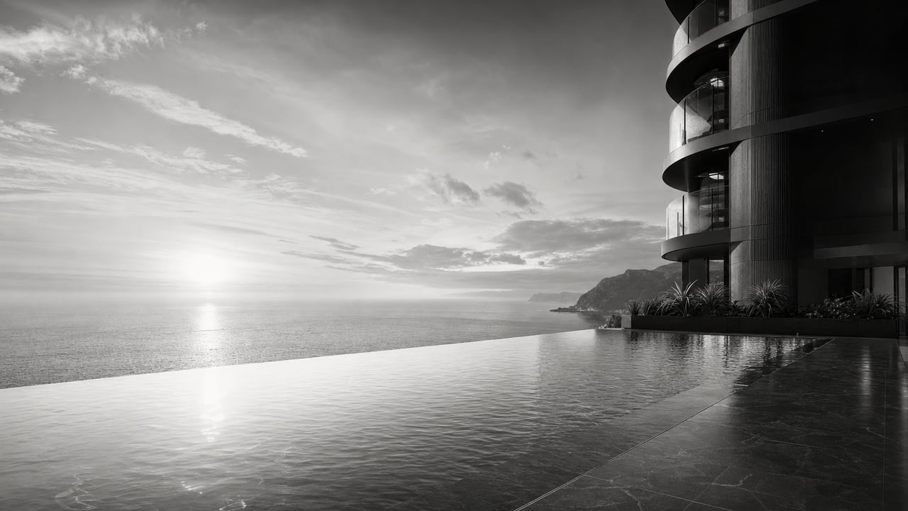 Infinity pool edge meeting the ocean horizon