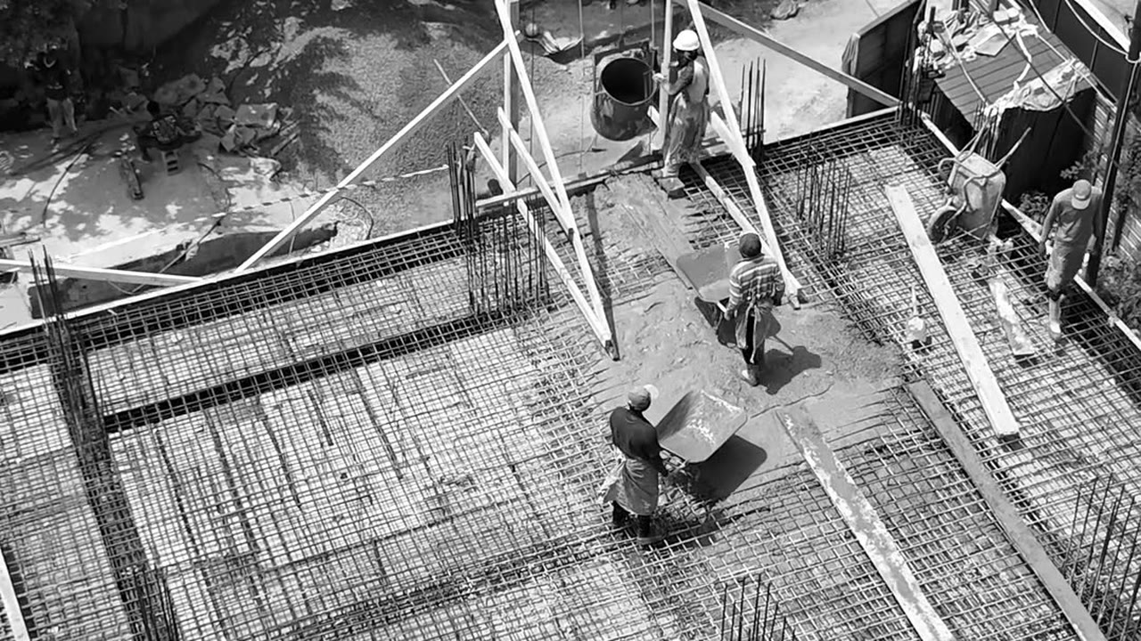 Overhead drone photograph of a Platinum Tower slab being poured, 13 October 2026